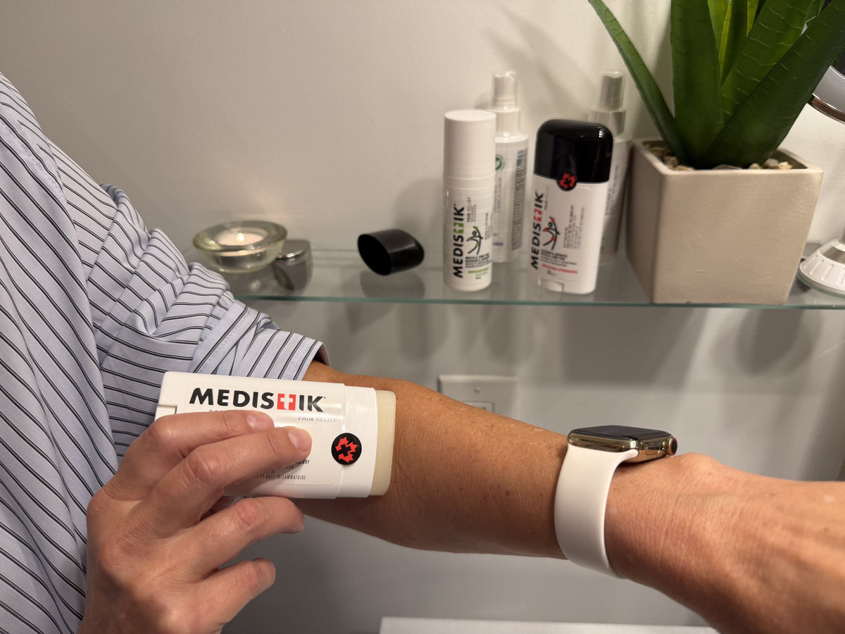 Gliding the Power Stick along a forearm, no hands touching the relief
