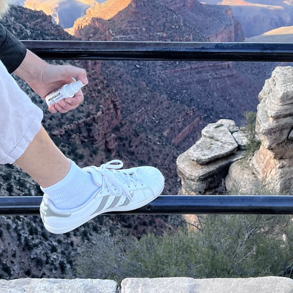 The Power Spray on a hiking shoe at a canyon rim